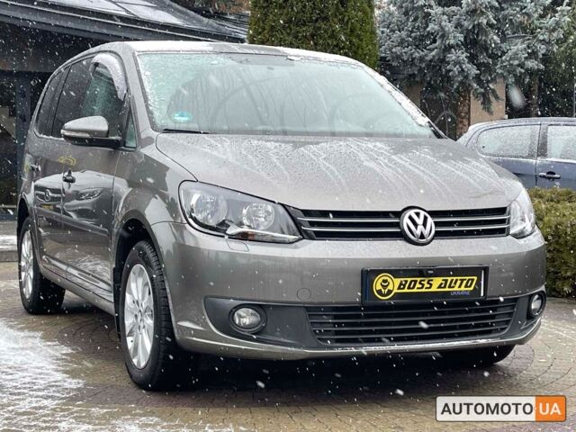 Серый Фольксваген Туран, объемом двигателя 1.4 л и пробегом 182 тыс. км за 9900 $, фото 1 на Automoto.ua