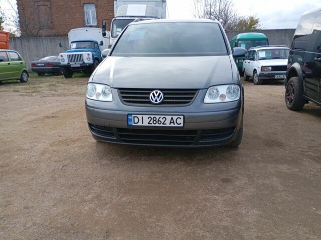 Сірий Фольксваген Туран, об'ємом двигуна 1.6 л та пробігом 311 тис. км за 5500 $, фото 1 на Automoto.ua