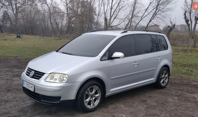 Сірий Фольксваген Туран, об'ємом двигуна 1.6 л та пробігом 285 тис. км за 6500 $, фото 1 на Automoto.ua