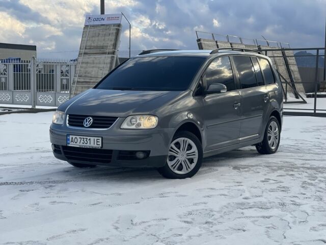 Сірий Фольксваген Туран, об'ємом двигуна 1.6 л та пробігом 293 тис. км за 5300 $, фото 1 на Automoto.ua