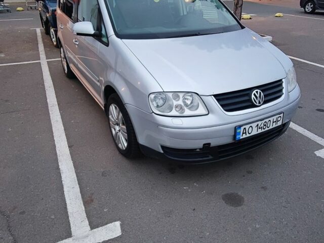 Серый Фольксваген Туран, объемом двигателя 1.6 л и пробегом 291 тыс. км за 4200 $, фото 1 на Automoto.ua