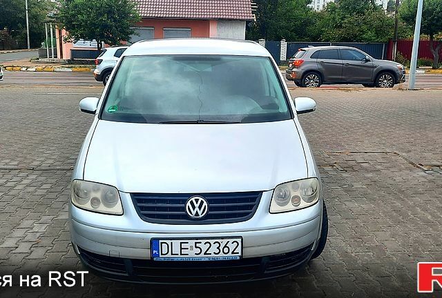 Серый Фольксваген Туран, объемом двигателя 1.9 л и пробегом 231 тыс. км за 2700 $, фото 1 на Automoto.ua