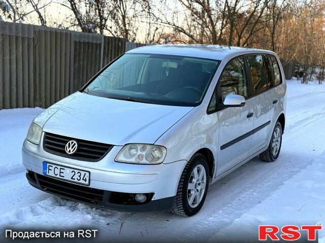 Сірий Фольксваген Туран, об'ємом двигуна 1.9 л та пробігом 300 тис. км за 2450 $, фото 1 на Automoto.ua