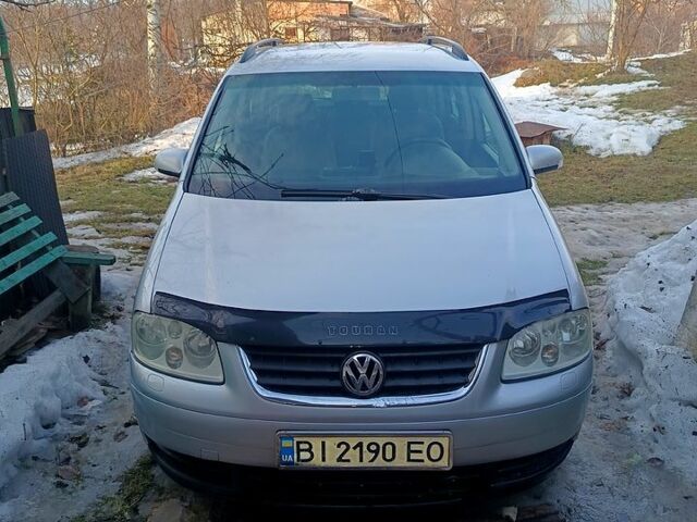 Сірий Фольксваген Туран, об'ємом двигуна 2 л та пробігом 409 тис. км за 5999 $, фото 1 на Automoto.ua