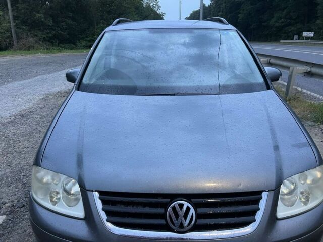 Серый Фольксваген Туран, объемом двигателя 1.9 л и пробегом 1 тыс. км за 2200 $, фото 1 на Automoto.ua