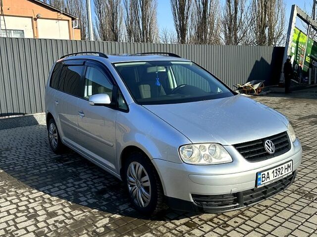 Сірий Фольксваген Туран, об'ємом двигуна 2 л та пробігом 338 тис. км за 6200 $, фото 1 на Automoto.ua