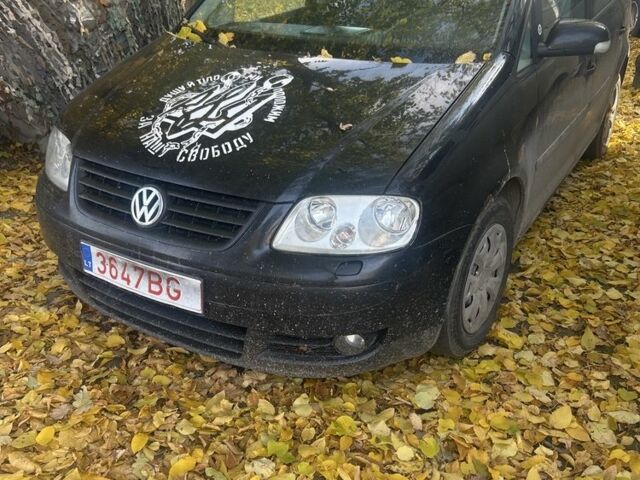 Серый Фольксваген Туран, объемом двигателя 1.9 л и пробегом 278 тыс. км за 3400 $, фото 1 на Automoto.ua