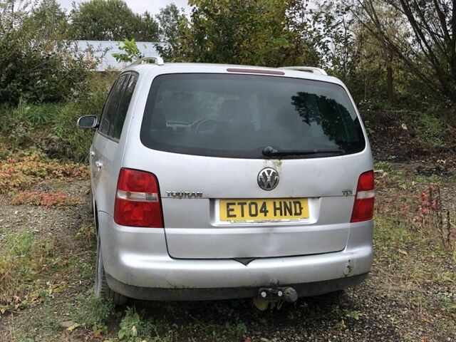 Серый Фольксваген Туран, объемом двигателя 2 л и пробегом 3 тыс. км за 1300 $, фото 1 на Automoto.ua