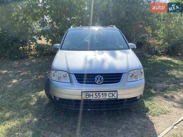 Серый Фольксваген Туран, объемом двигателя 1.6 л и пробегом 172 тыс. км за 6300 $, фото 1 на Automoto.ua