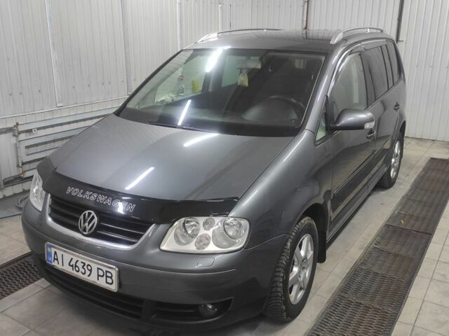 Серый Фольксваген Туран, объемом двигателя 2 л и пробегом 293 тыс. км за 6100 $, фото 1 на Automoto.ua