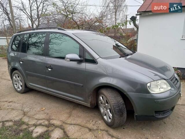 Серый Фольксваген Туран, объемом двигателя 1.9 л и пробегом 308 тыс. км за 5700 $, фото 1 на Automoto.ua