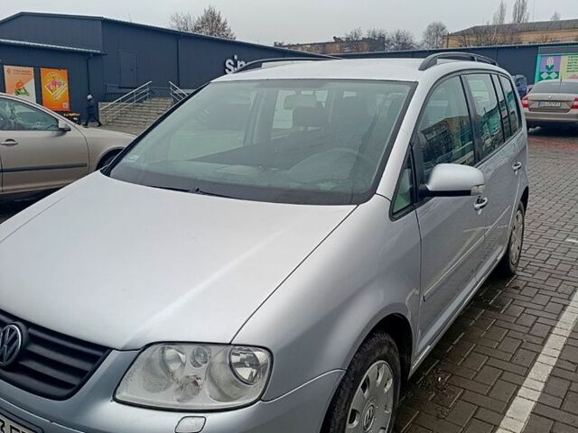 Серый Фольксваген Туран, объемом двигателя 1.9 л и пробегом 245 тыс. км за 5800 $, фото 1 на Automoto.ua