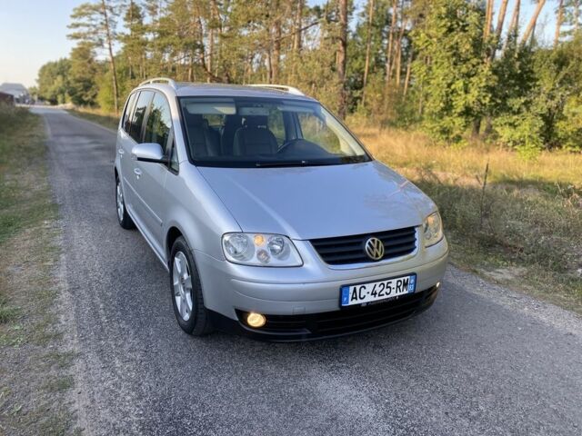 Сірий Фольксваген Туран, об'ємом двигуна 2 л та пробігом 365 тис. км за 3500 $, фото 1 на Automoto.ua
