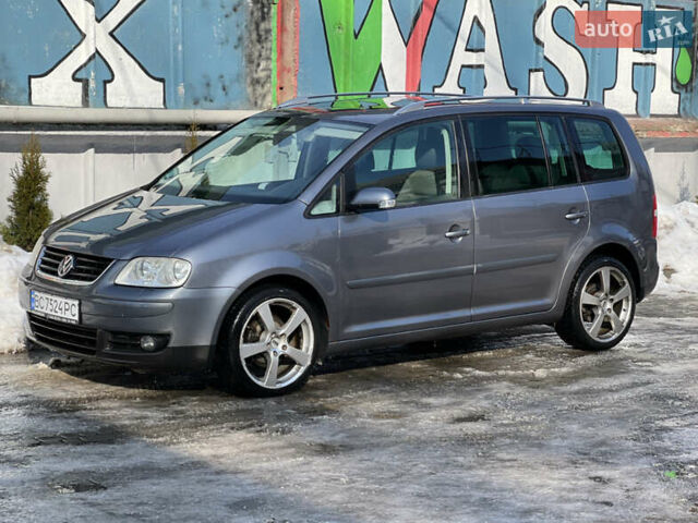 Серый Фольксваген Туран, объемом двигателя 1.97 л и пробегом 311 тыс. км за 6500 $, фото 1 на Automoto.ua