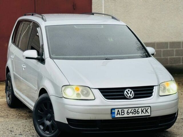 Серый Фольксваген Туран, объемом двигателя 1.6 л и пробегом 180 тыс. км за 6550 $, фото 1 на Automoto.ua