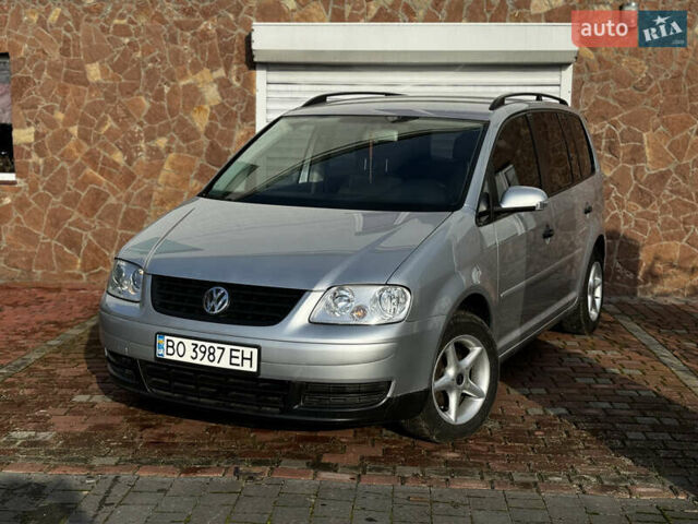 Серый Фольксваген Туран, объемом двигателя 1.9 л и пробегом 205 тыс. км за 5600 $, фото 1 на Automoto.ua