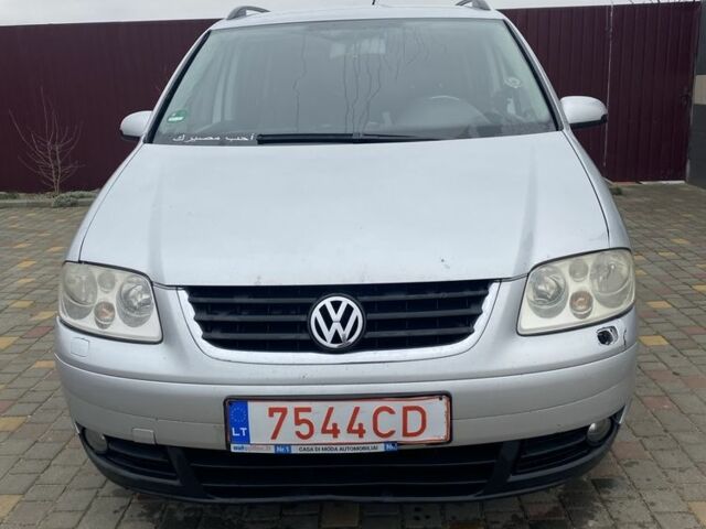 Сірий Фольксваген Туран, об'ємом двигуна 2 л та пробігом 290 тис. км за 2371 $, фото 1 на Automoto.ua