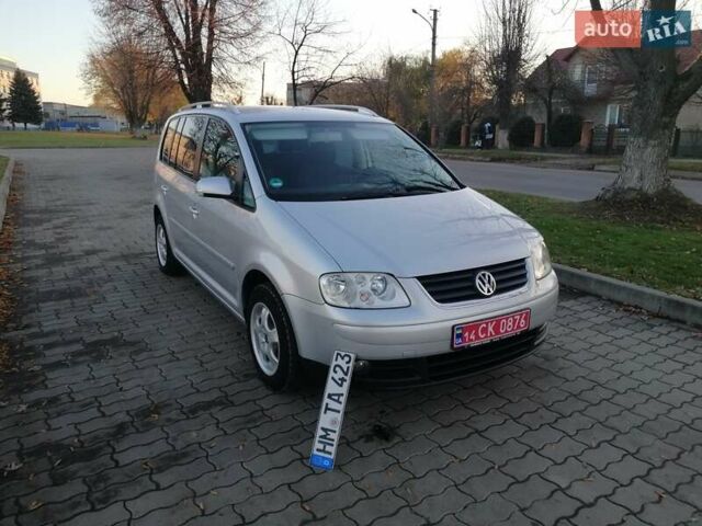 Серый Фольксваген Туран, объемом двигателя 1.6 л и пробегом 252 тыс. км за 5700 $, фото 1 на Automoto.ua