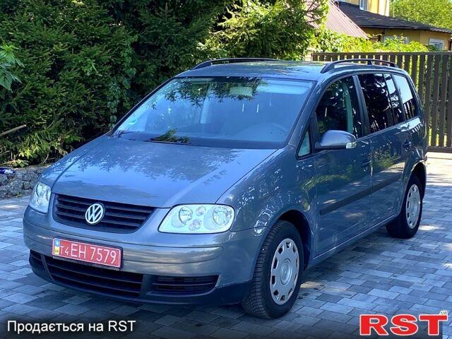 Серый Фольксваген Туран, объемом двигателя 1.6 л и пробегом 184 тыс. км за 5900 $, фото 1 на Automoto.ua