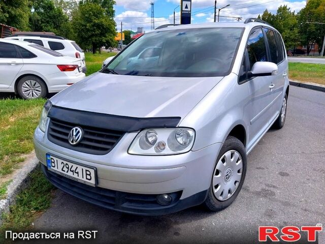 Сірий Фольксваген Туран, об'ємом двигуна 1.6 л та пробігом 219 тис. км за 6699 $, фото 1 на Automoto.ua