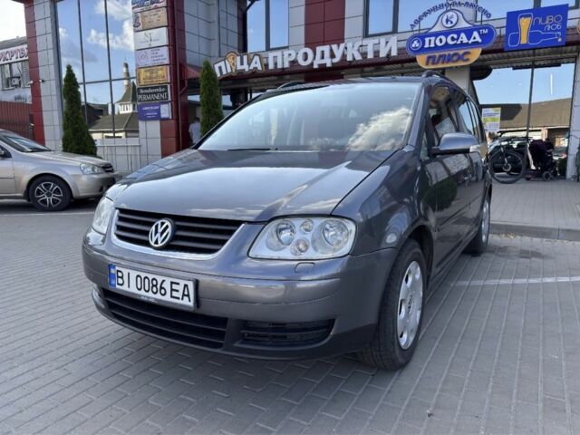 Сірий Фольксваген Туран, об'ємом двигуна 1.6 л та пробігом 180 тис. км за 5200 $, фото 1 на Automoto.ua