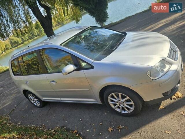 Серый Фольксваген Туран, объемом двигателя 2 л и пробегом 370 тыс. км за 6200 $, фото 1 на Automoto.ua