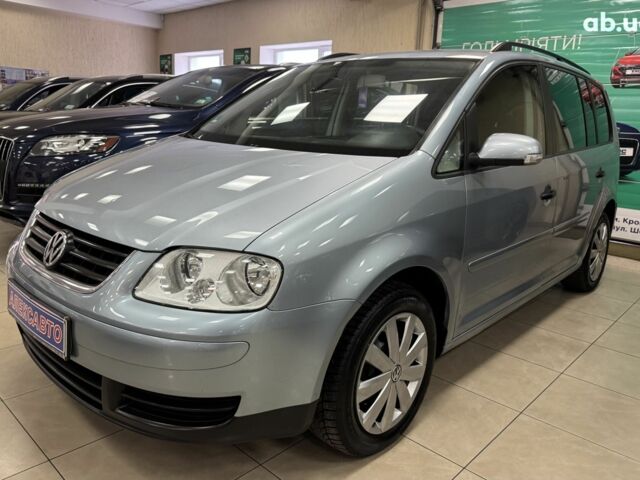 Серый Фольксваген Туран, объемом двигателя 0 л и пробегом 213 тыс. км за 6600 $, фото 1 на Automoto.ua