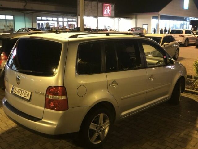 Серый Фольксваген Туран, объемом двигателя 2 л и пробегом 260 тыс. км за 7599 $, фото 1 на Automoto.ua