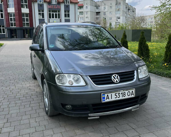 Серый Фольксваген Туран, объемом двигателя 1.98 л и пробегом 313 тыс. км за 5299 $, фото 1 на Automoto.ua