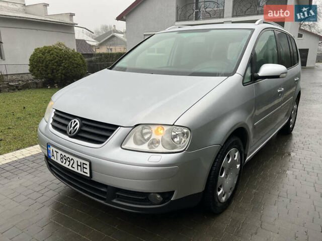 Сірий Фольксваген Туран, об'ємом двигуна 1.97 л та пробігом 305 тис. км за 6800 $, фото 1 на Automoto.ua