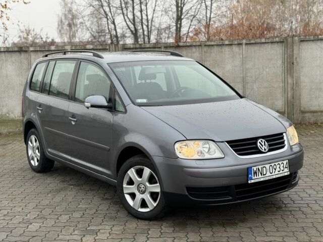 Серый Фольксваген Туран, объемом двигателя 2 л и пробегом 370 тыс. км за 2550 $, фото 1 на Automoto.ua