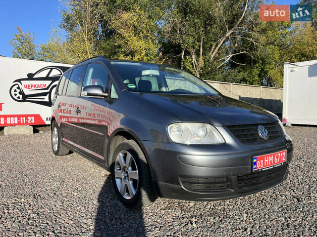 Сірий Фольксваген Туран, об'ємом двигуна 1.6 л та пробігом 238 тис. км за 6300 $, фото 1 на Automoto.ua
