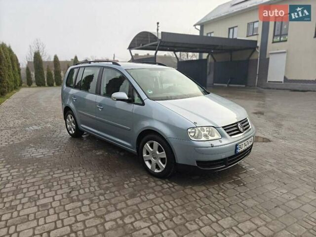 Серый Фольксваген Туран, объемом двигателя 1.6 л и пробегом 205 тыс. км за 5950 $, фото 1 на Automoto.ua