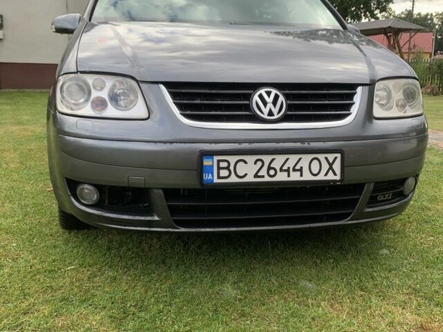 Сірий Фольксваген Туран, об'ємом двигуна 2 л та пробігом 450 тис. км за 5100 $, фото 1 на Automoto.ua