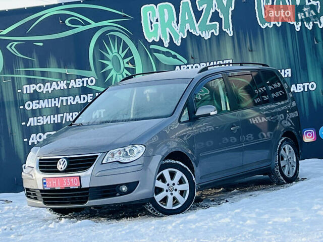 Сірий Фольксваген Туран, об'ємом двигуна 1.4 л та пробігом 233 тис. км за 6900 $, фото 1 на Automoto.ua