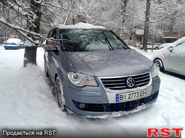 Сірий Фольксваген Туран, об'ємом двигуна 1.4 л та пробігом 268 тис. км за 6000 $, фото 1 на Automoto.ua