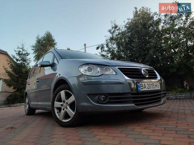 Сірий Фольксваген Туран, об'ємом двигуна 1.4 л та пробігом 246 тис. км за 6900 $, фото 1 на Automoto.ua