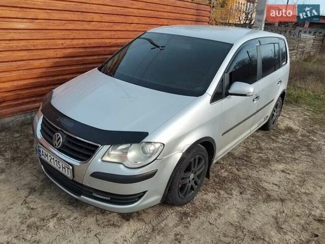 Серый Фольксваген Туран, объемом двигателя 1.39 л и пробегом 219 тыс. км за 4999 $, фото 1 на Automoto.ua