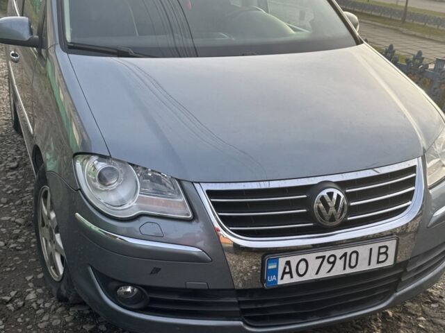 Сірий Фольксваген Туран, об'ємом двигуна 1.4 л та пробігом 318 тис. км за 5600 $, фото 1 на Automoto.ua