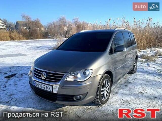 Сірий Фольксваген Туран, об'ємом двигуна 1.39 л та пробігом 230 тис. км за 7600 $, фото 1 на Automoto.ua