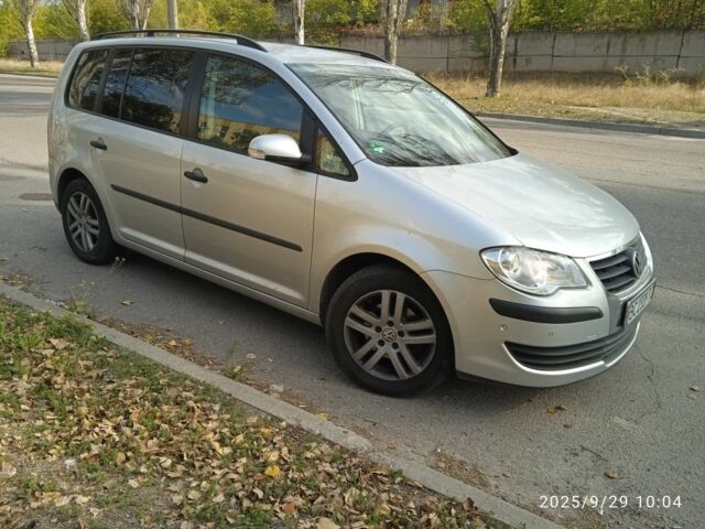 Сірий Фольксваген Туран, об'ємом двигуна 1.4 л та пробігом 231 тис. км за 6999 $, фото 1 на Automoto.ua