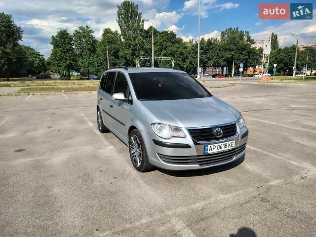 Сірий Фольксваген Туран, об'ємом двигуна 1.4 л та пробігом 206 тис. км за 6900 $, фото 1 на Automoto.ua