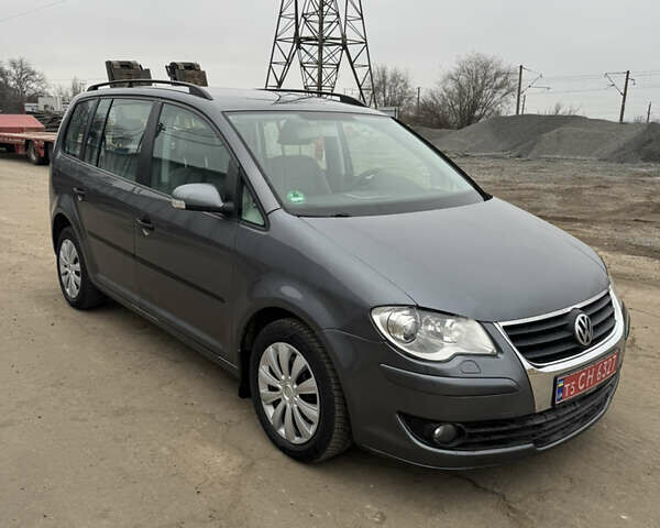 Сірий Фольксваген Туран, об'ємом двигуна 1.4 л та пробігом 185 тис. км за 7500 $, фото 1 на Automoto.ua