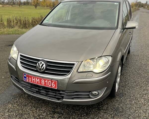 Сірий Фольксваген Туран, об'ємом двигуна 1.4 л та пробігом 205 тис. км за 6950 $, фото 1 на Automoto.ua