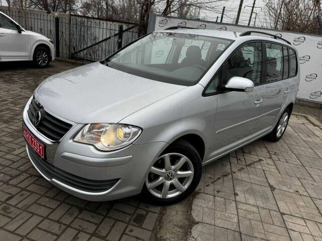 Серый Фольксваген Туран, объемом двигателя 1.4 л и пробегом 149 тыс. км за 7300 $, фото 1 на Automoto.ua