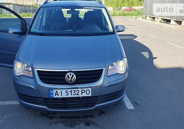 Серый Фольксваген Туран, объемом двигателя 1.39 л и пробегом 197 тыс. км за 8200 $, фото 1 на Automoto.ua