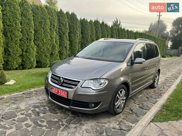 Сірий Фольксваген Туран, об'ємом двигуна 1.4 л та пробігом 193 тис. км за 6999 $, фото 1 на Automoto.ua