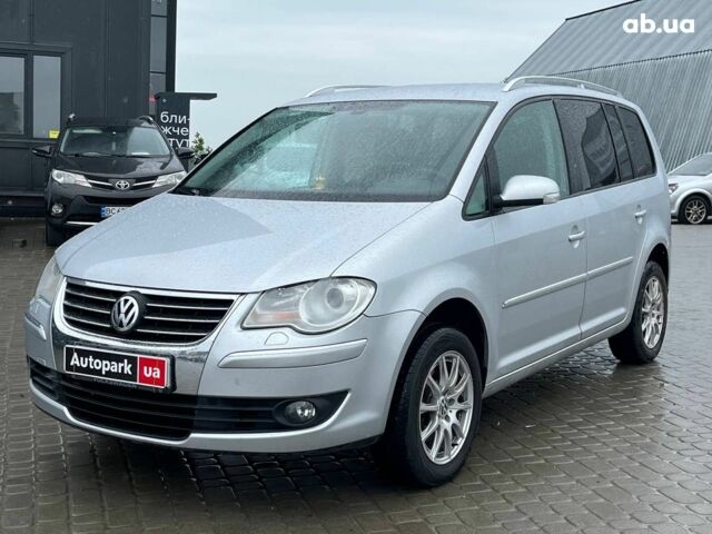 Серый Фольксваген Туран, объемом двигателя 1.4 л и пробегом 256 тыс. км за 7490 $, фото 1 на Automoto.ua