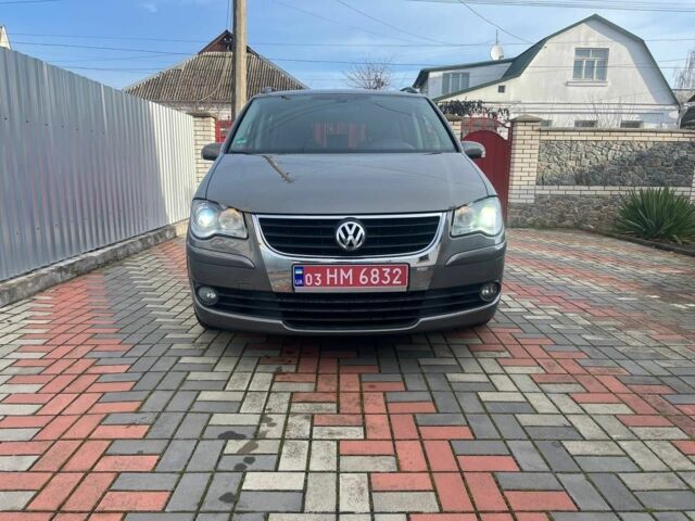 Серый Фольксваген Туран, объемом двигателя 1.4 л и пробегом 170 тыс. км за 7700 $, фото 1 на Automoto.ua