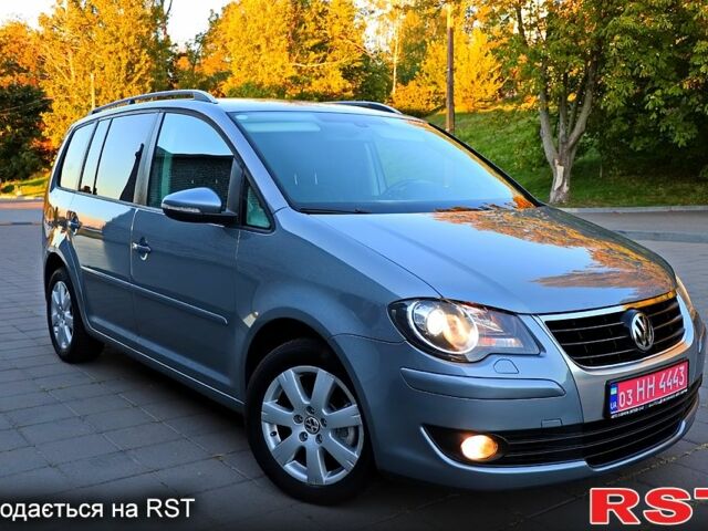 Сірий Фольксваген Туран, об'ємом двигуна 1.4 л та пробігом 267 тис. км за 8555 $, фото 1 на Automoto.ua